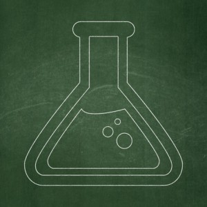Science concept: Flask icon on Green chalkboard background